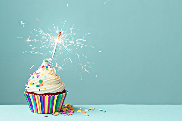 A cupcake with sparkler candle