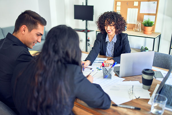 Young couple applying for a mortgage.