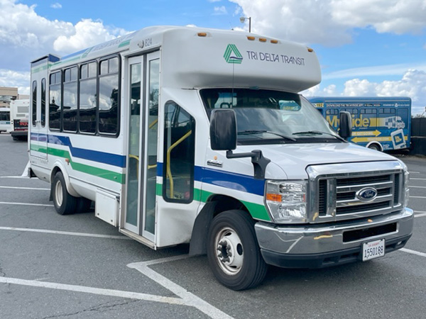 Paratransit vehicle in the bus yard